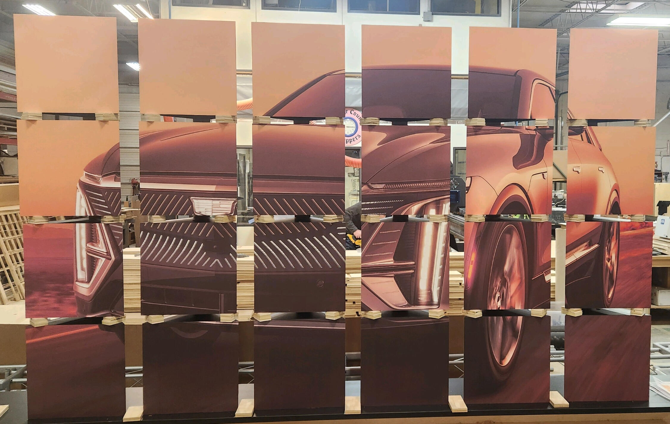 This project was made for Cadillac for a car show. Design layout was a bit complex due to the spacing of the squares precision was key in order to have the image of the car not be lost and clearly seen. Client had final approval prior to production in orde